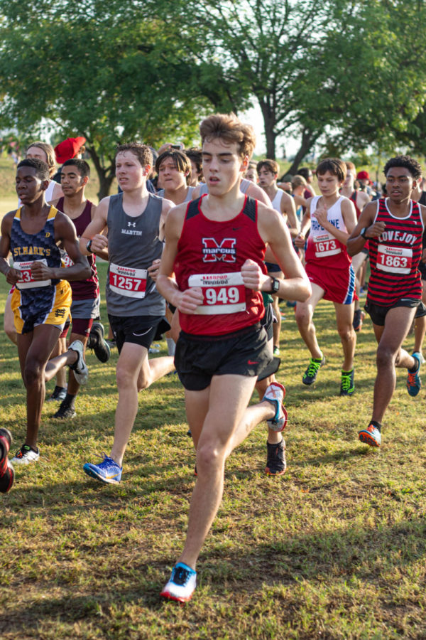 Junior Kyle Porter runs along with athletes from 35 different teams. This was cross country's second meet and the first one that they hosted this season.