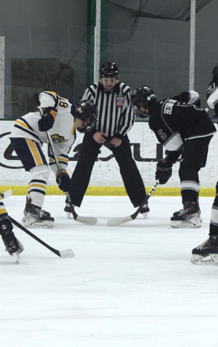 After a foul was called on Highland Park, the two teams faced off on the ice to start the game back up.