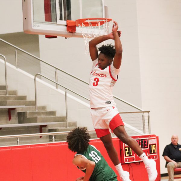 Jayden Ramnanan, 12, defends the basket in a 65-59 home victory over Prosper on November 12, 2024.